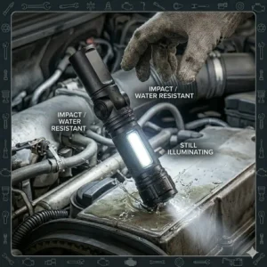 A durable and water resistant mechanic flashlight dropped on a garage floor.